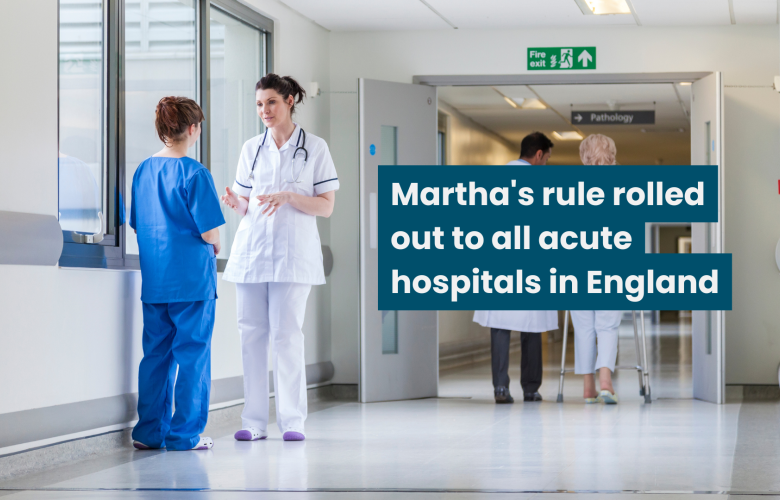 A photo of a hospital corridor with two medical staff speaking to each other. Text reads 'Martha's rule rolled out to all acut hospitals in England'