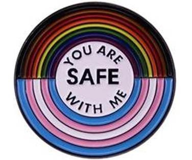 A photo of an icon with the trans and liberty pride flags in a circle that says 'you are safe with me' in the centre