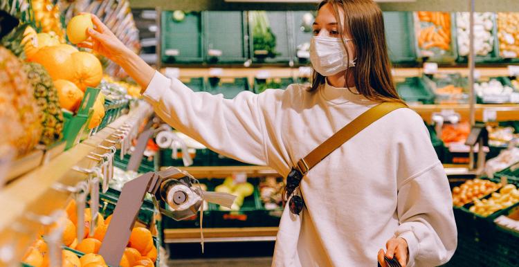 woman wearing mask in supermarket