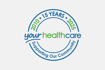 A logo celebrating 15 years of your healthcare