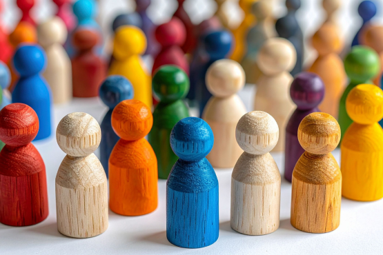a photo of brightly coloured wooden figures