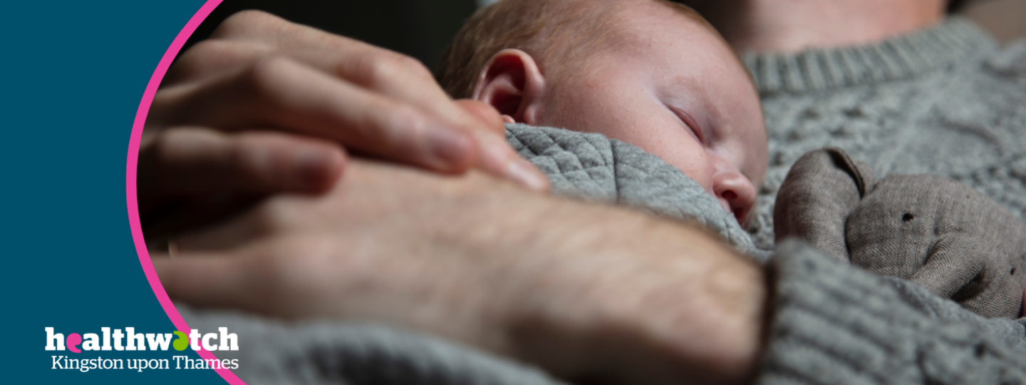 A photo of a young baby sleeping on their fathers chest